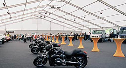 Motor exhibition showing large marquee